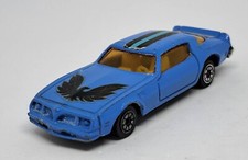 VOITURE PONTIAC FIREBIRD TRANS AM REF 801 1/64 1:64 BLEU AVEC OISEAU SUR CAPOT