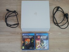 ?  PlayStation 4 Pro 1TB ou 1To Blanche + 2 Jeux (Minecraft & LEGO Star Wars)