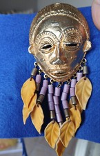 Broche fantaisie masque facial