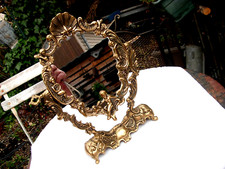Beau miroir ancien forme de médaillon ange putto bronze laiton style louis XV