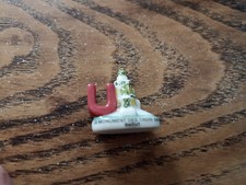 fève le monument les trois sieges Befort Pâtisserie Demeusy 80 ans 2002 U perso