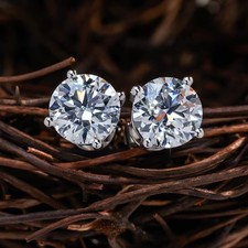 Clous solitaire diamant blanc