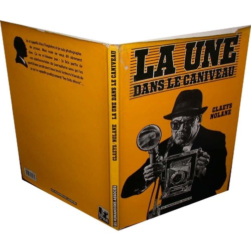 Livre une dans caniveau - une,