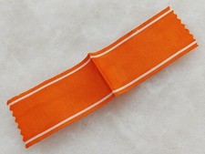 Un ruban médaille Ouissam Alaouite.