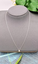 Collier pendentif serti d'un diamant d'environ 0,14ct en or blanc Or 750 Milliè