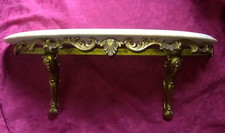 Console murale en bronze et