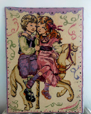 Enfants sur un caroussel canevas terminé sur contre plaqué