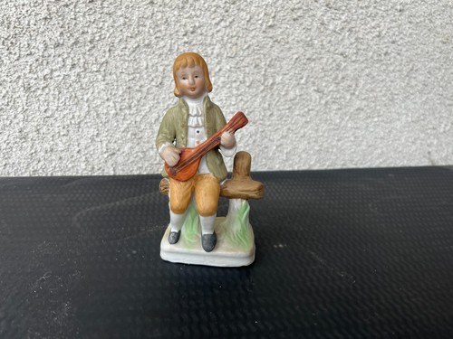 Statuette porcelaine jeune