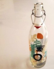 Bouteille "Cerve" vide en verre blanc sérigraphié, avec bouchon mécanique. 2015.