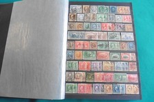 ETATS UNIS : 2100 Timbres Oblitérés en classeur chronologique 32 pages pleines