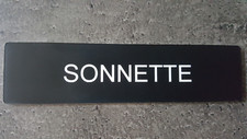 Plaque gravée" SONNETTE  "avec adhésif ,étiquette 10 cm x 2.5 cm x 1,6 mm 