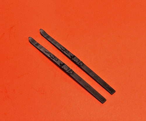 Paire skis noir - de,