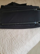 sac de voyage à roulettes avec poignée télescopique 42 cms.