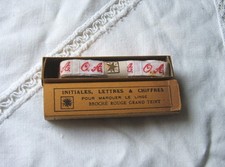 Ancien ruban initiales tissé