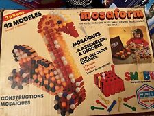 jeu vintage smoby mosaïques à assembler avec des clous colorés