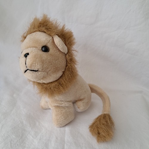 Peluche doudou lion - , hauteur