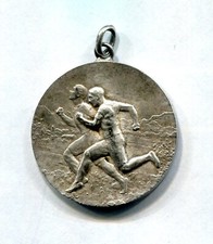 Médaille argent plaqué