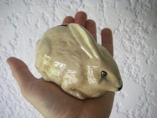 ancienne TIRELIRE à casser lièvre lapin Faience de St Uze ?