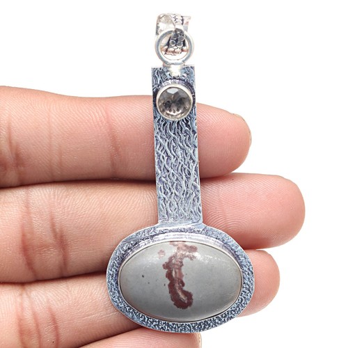 Pendentif créateur pierre