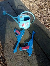 Jouets anciens arrosoir en