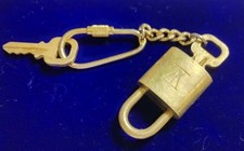 Cadenas LOUIS VUITTON bronze
