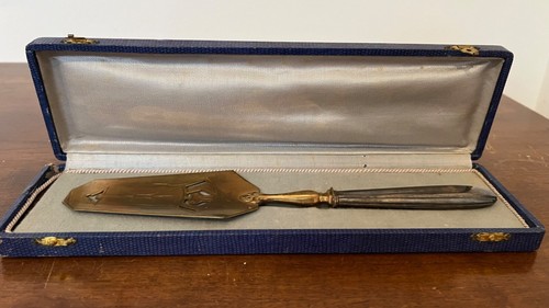 Pelle tarte manche argent - à,