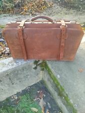 Sac de voyage vintage en cuir marron à renover