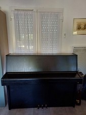 piano droit Seiler de 1996. fabrication allemande réputée. Noir, excellent état 