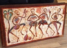 Batik tableau africain réalisé au Burkina Faso tendu sur cadre par encadreur