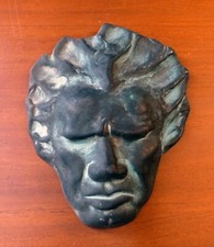 Masque mural en céramique