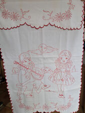 cache torchon tissu brodé