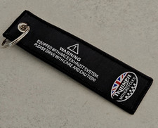 TRIUMPH porte clé MOTO neuf TRIUMPH logo double face!