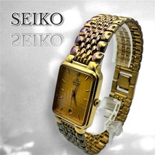 Montre-bracelet Seiko à quartz vintage dorée avec boîtier en acier inoxydable...