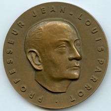 MEDAILLE BRONZE PERROQUET JEAN