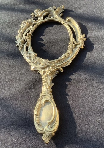 Ancien miroir face - face, en