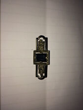 Broche Art Déco. Argent et strass et pierre noire.