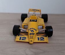 Miniature : Lotus 97 T  nr.12, Burago, 1/24. TBE. Model : NM.