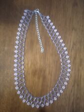 Collier zulu avec des fleurs en perles miyuki violet et rose Collier ethnique