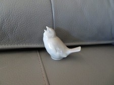 Tharaud oiseau en porcelaine