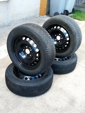 4 roues avec pneus hiver Michelin Alpin 5 205/55 R16 91H et 4 jantes tôle