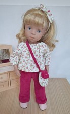 Vêtements pour poupée