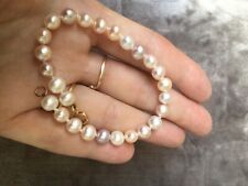 bracelet perles de culture crème, rose, lilas en or 18 carats