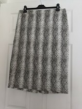 Jupe midi en peau de serpent