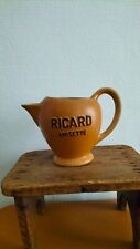 Pichet  à eau publicitaire RICARD  en céramique d'occasion, très bon état.