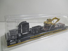 55415- PETERBILT 389 porte engins 3 essieux et pelle 315C L CATERPILLAR 1/87