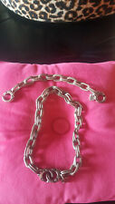 Collier ras du cou et bracelet menottes, Uno de 50