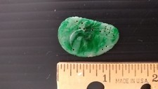 Very rare, finely carved green