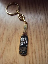 ANCIEN PORTE CLE CHAMPAGNE PERRIER JOUET EMAILLE