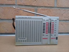 Radio portable de poche Schneider modèle TR0121 sur piles gammes FM/MW/LW