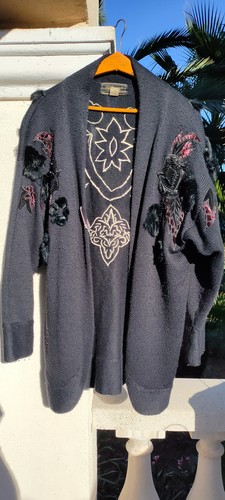 Gilet noir avec très jolis